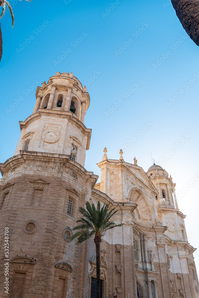 Obraz premium Towers and the facade of the Holy Cathedral Church in the city of Cadiz. Andalusia