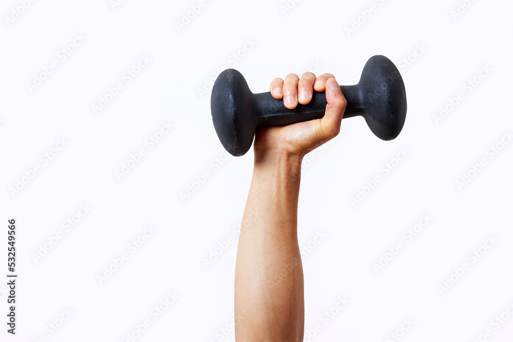 Cropped sportsman raising arm with dumbbell Cropped sportsman raising arm with dumbbell