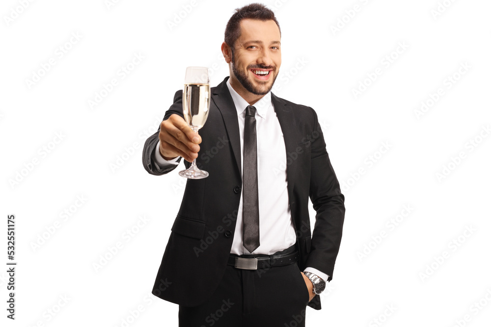 Businessman toasting with a glass of champagne and smiling at camera Businessman toasting with a glass of champagne and smiling at camera