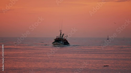 Fishing boat returned from the sea at sunrise, Itajaí - Santa Catarina