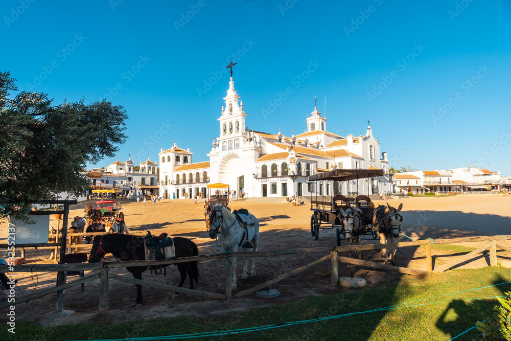 Obraz premium Horses prepared to ride in the Rocio sanctuary at the Rocio festival, Huelva. Andalusia