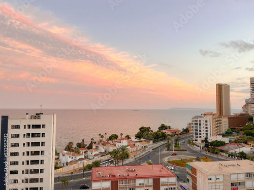 View to the city on the sea from above photo