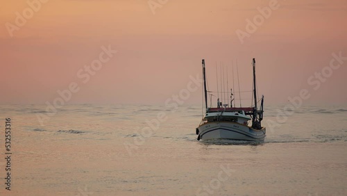 Fishing boat returned from the sea at sunrise, Itajaí - Santa Catarina