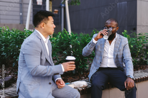 Dialogue of colleagues over coffee 