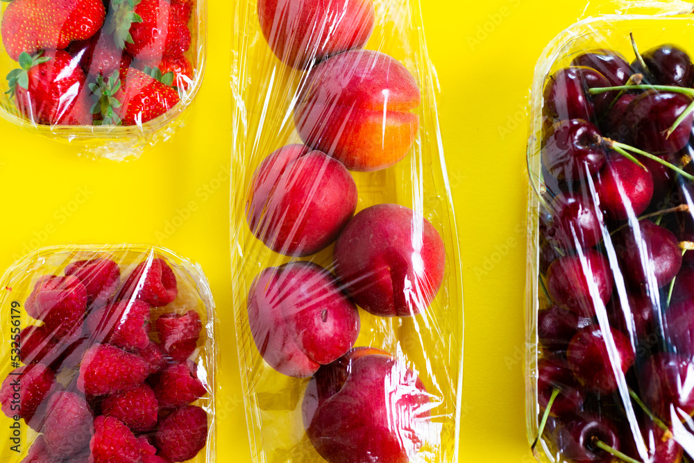 Colorful fruit wrapped in plastic Stock Photo Adobe Stock