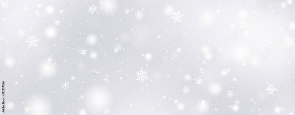 Decorative christmas background with bokeh lights and snowflakes