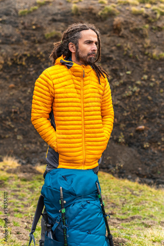 Adult montaineer with gray hair and dreadlocks
 photo