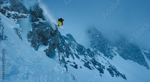 Skier dropping in  photo