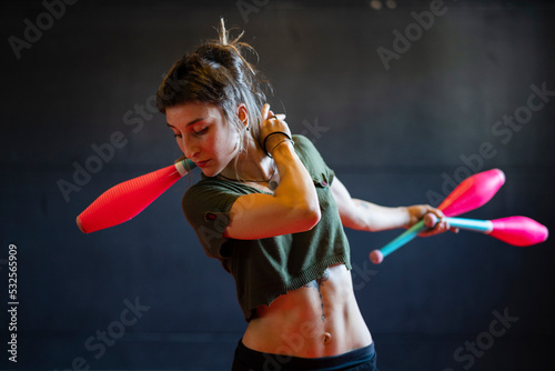 Portrait of a powerful female juggler
