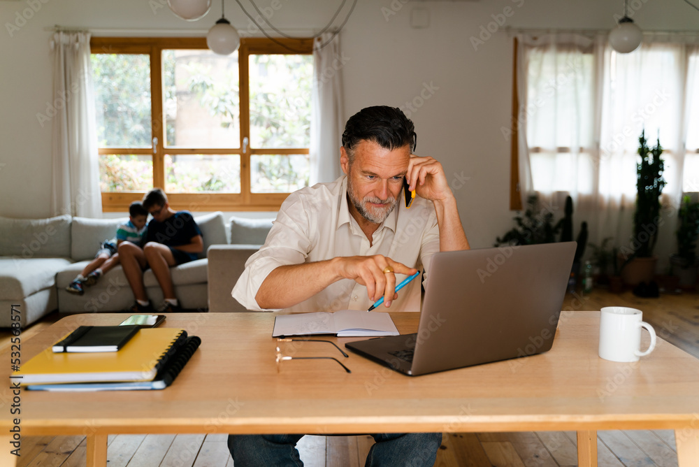 Businessman Working In Home Office Businessman Working In Home Office