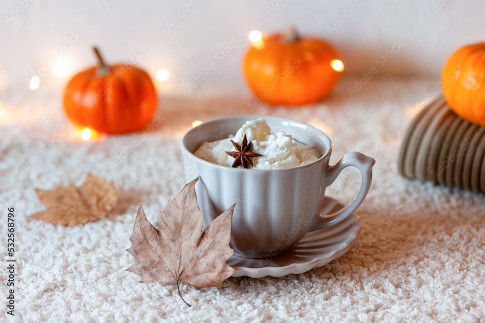 Cosy autumn composition with hot drink and mini pumpkins Cosy autumn composition with hot drink and mini pumpkins