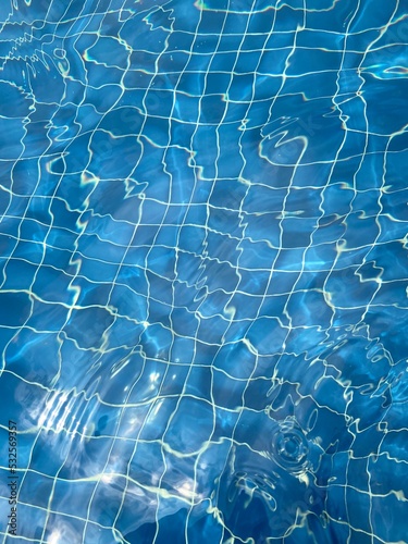 Swimming pool water close up view in flowing condition photo