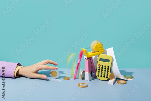Conceptual finance still life with office supplies