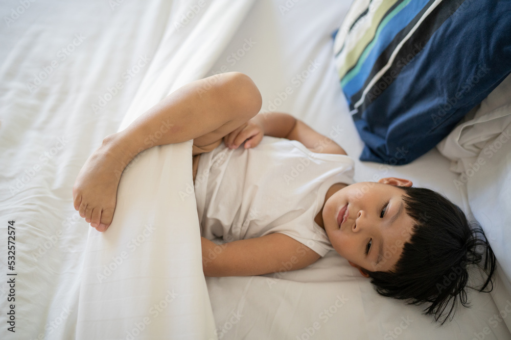 Asian boy on the bed Asian boy on the bed