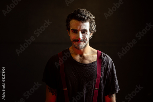Joker artist with a crazy face