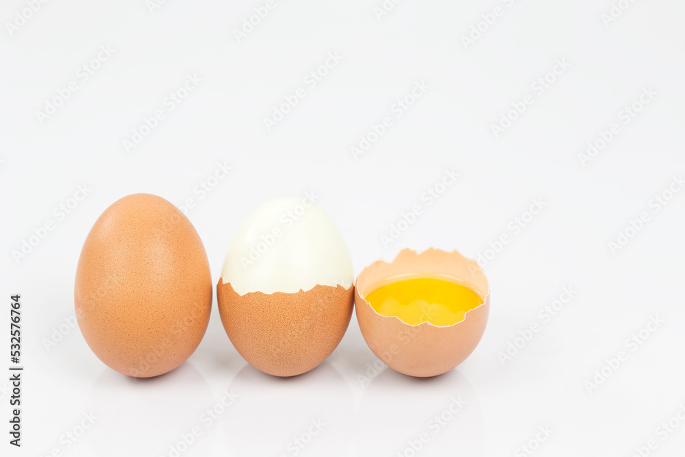Eggs and egg yolk on the White background. This can be used as a business card background and can be used as an advertising image. Eggs and egg yolk on the White background. This can be used as a business card background and can be used as an advertising image.