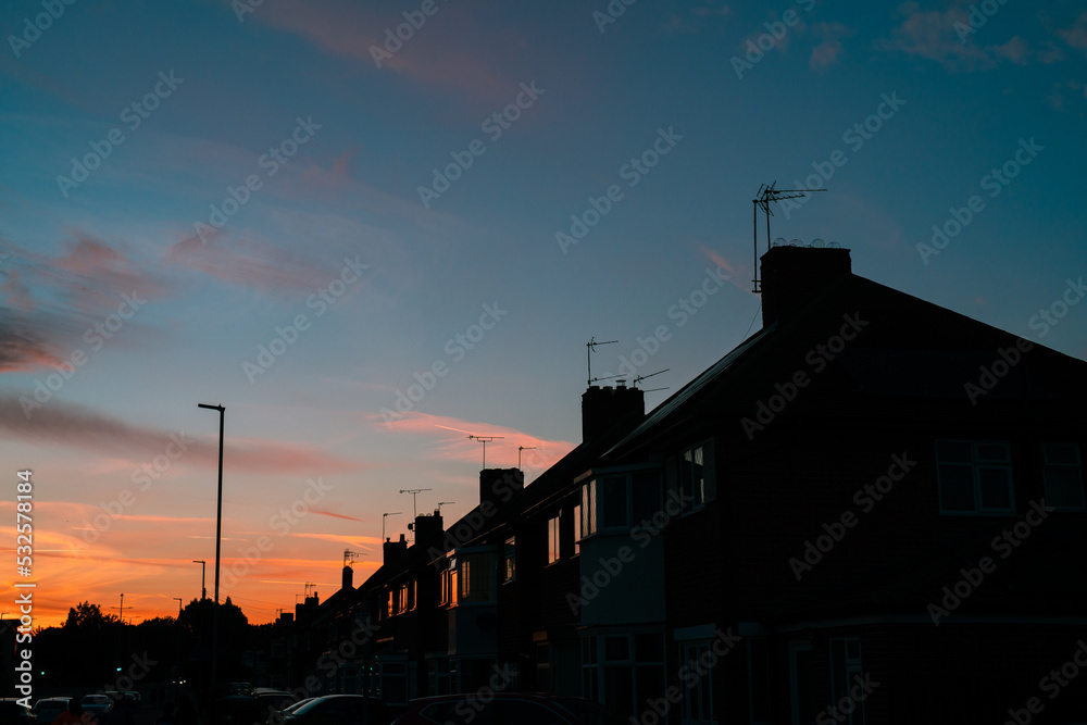 British houses silhouette at sunset