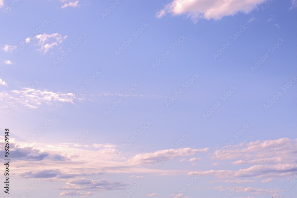 Clear, peaceful blue sky with fluffy clouds floating,Background Banner Screen saver on the monitor.