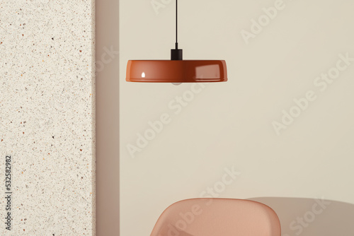 Ceiling lamp above an armchair photo