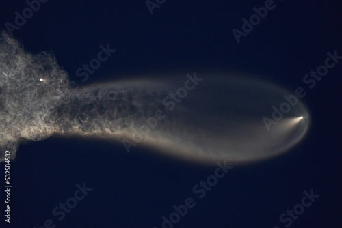 A rocket launches into space with a vapor tail in Florida