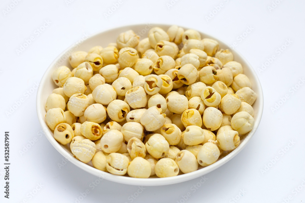 Dried lotus seeds on white background. Dried lotus seeds on white background.