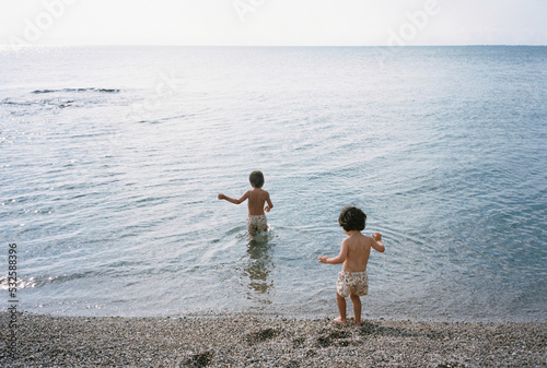 Young child on the beach photo