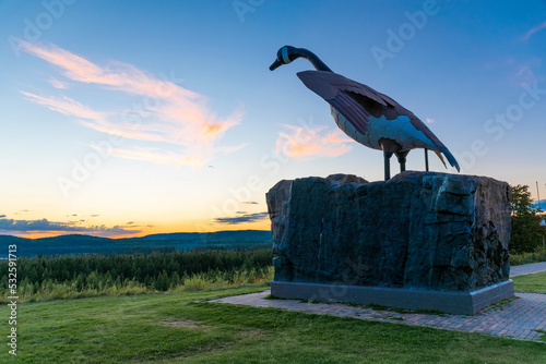 The larger-than-life statue of the Wawa Goose overlooks the surrounding forest as it marks the entrance into the small Ontario town of Wawa. photo