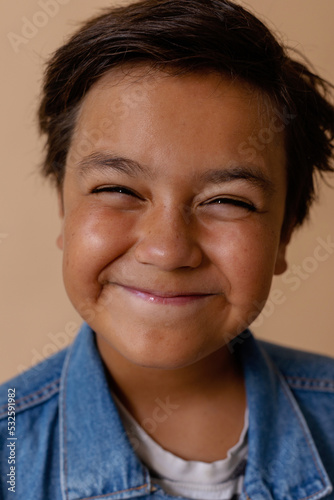 Funny preteen hispanic boy portrat photo