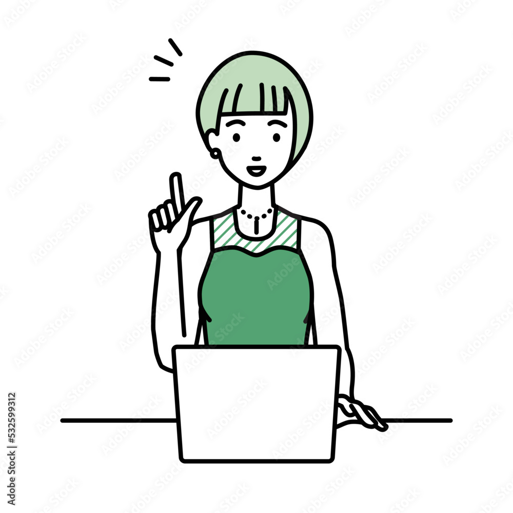 デスクで座ってPCを開いて何かひらめいたドレスの女性