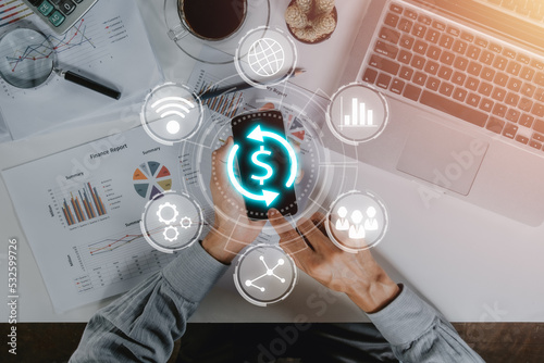 SWIFT. Society for Worldwide Interbank Financial Telecommunications, Businessman using smartphone with VR screen swift icon on office desk, Financial Banking regulation concept.