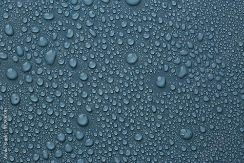 Wallpaper Mural Many water drops on dark dusty blue background Torontodigital.ca