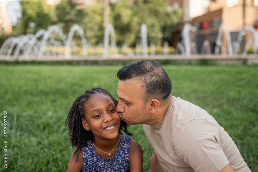 multiracial family of father and daughter in the park outdoors multiracial family of father and daughter in the park outdoors
