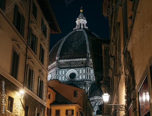 The Duomo and buildings lit at night