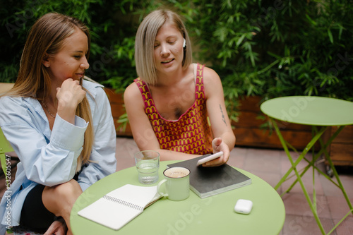 Business meeting in a coffee shop photo