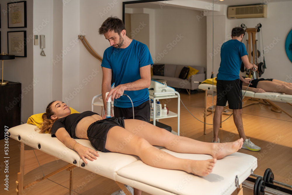Professional Therapist In A Physiotherapy Clinic Rehabilitation.