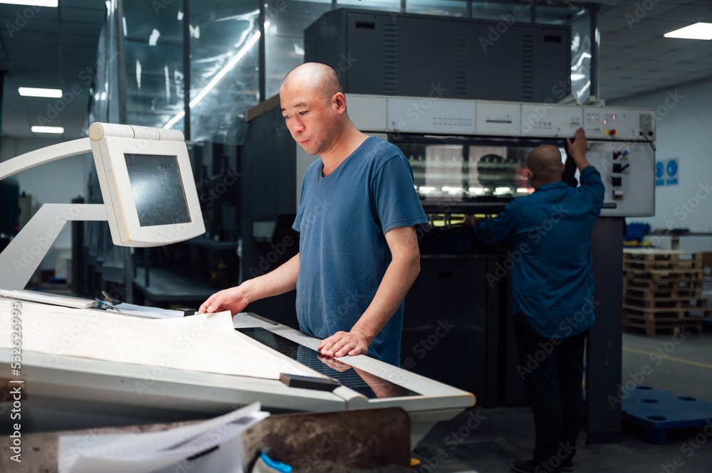 Asian workers in printing industry Asian workers in printing industry