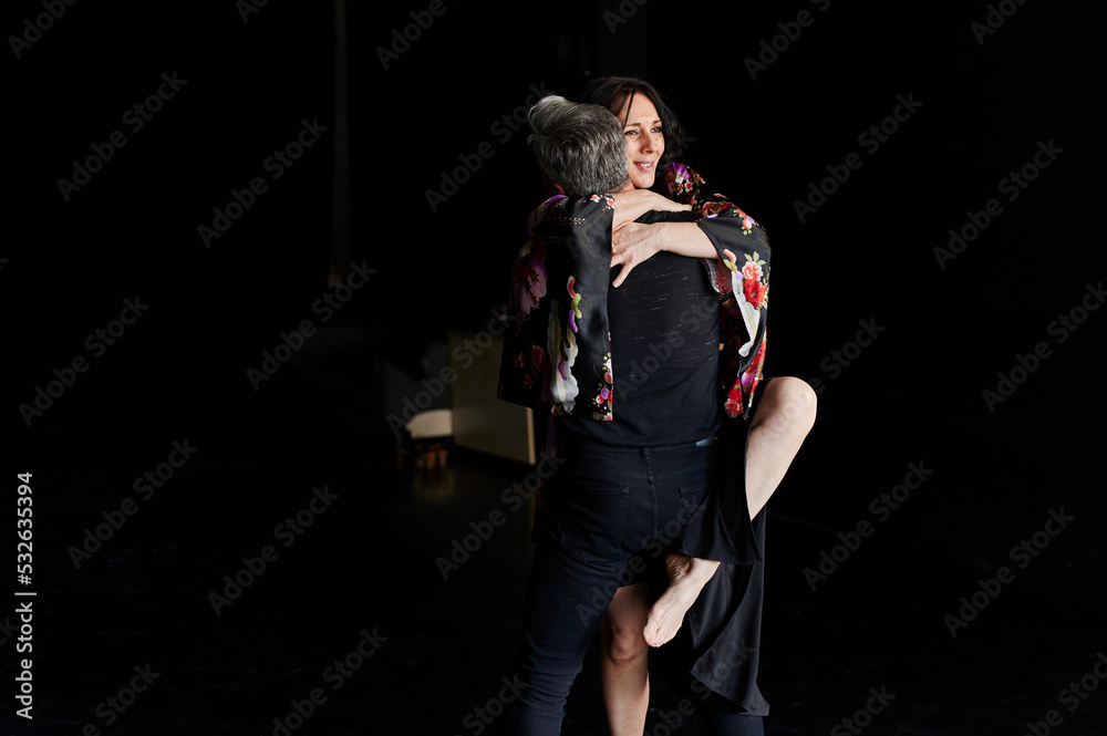 Mature dancers rehearsing in a studio Mature dancers rehearsing in a studio