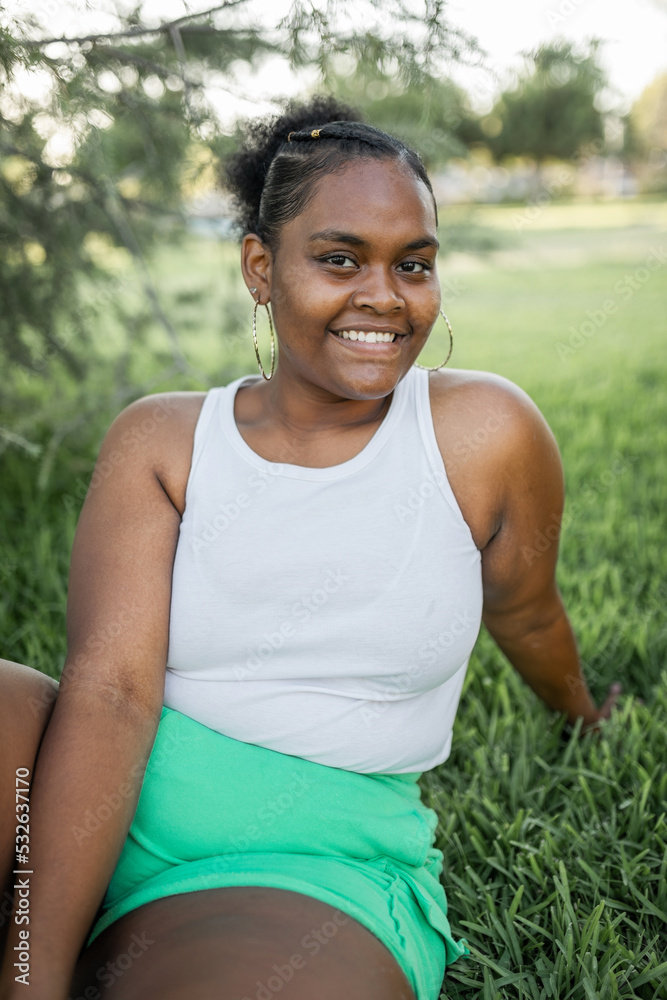 portrait of young black plus size woman in nature portrait of young black plus size woman in nature