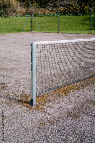 Tennis net on an empty court photo