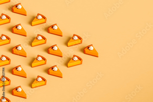 triangle of pumpking pie sliceswith copy space