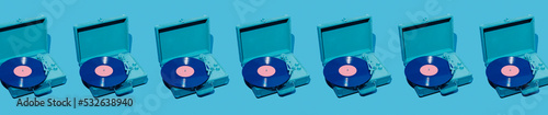 blue turntables with violet discs, banner format photo