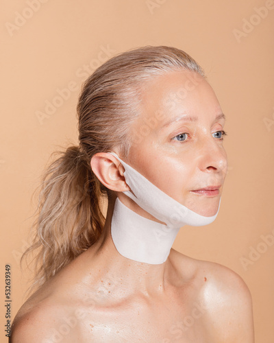 Facelift with taping and mask photo