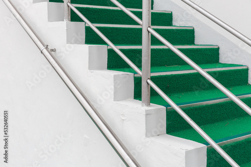 Close-up of green stairs. photo