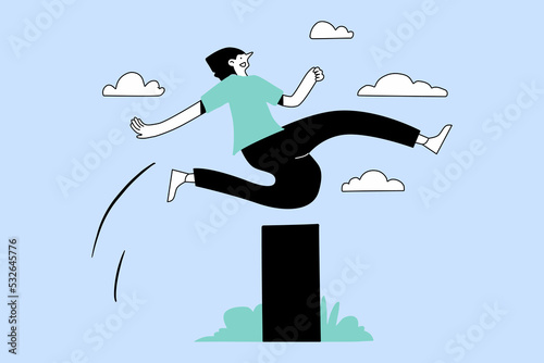 A Woman Jumping a Wall