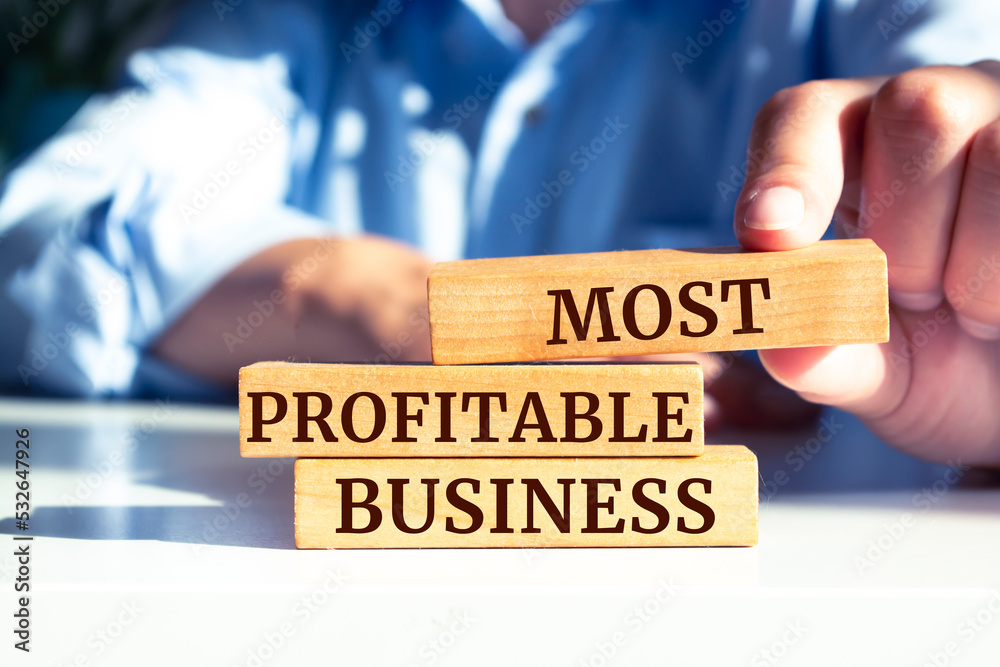 Wooden blocks with words 'Most Profitable Business'. Wooden blocks with words 'Most Profitable Business'.