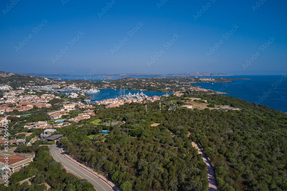 One of the most expensive resorts in the world. Aerial View of Porto Cervo, Italian seaside resort in northern Sardinia, Italy. Drone view Centre of Costa Smeralda.