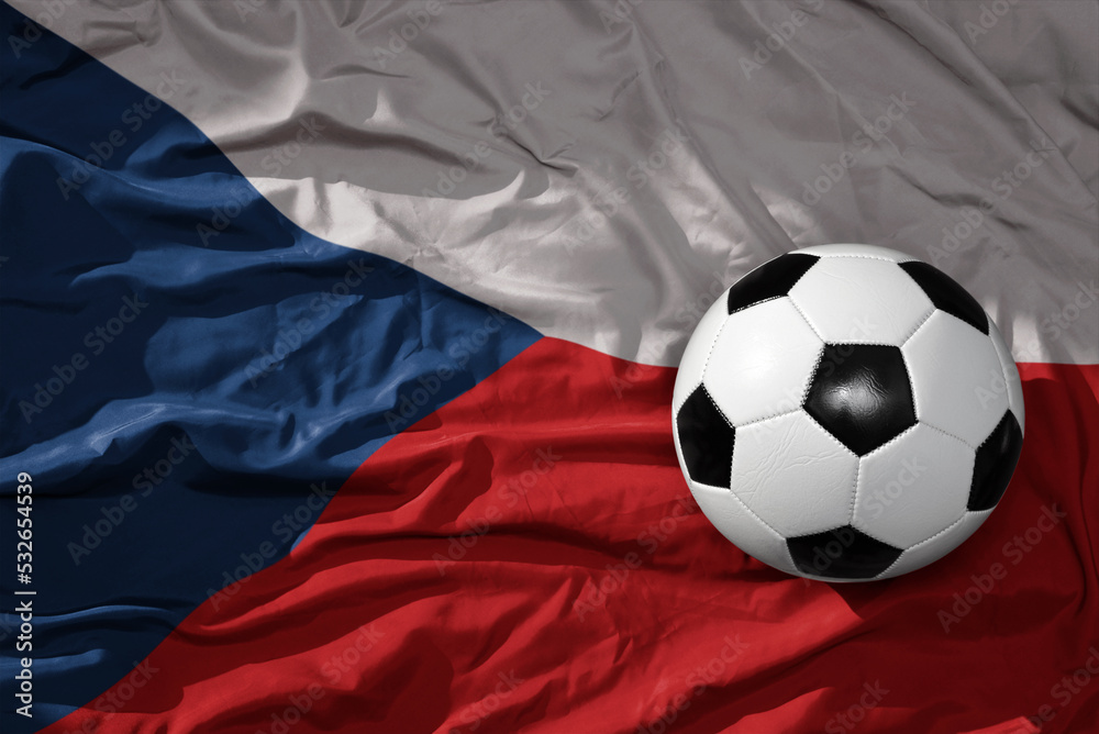 Fototapeta premium vintage football ball on the waveing national flag of czech republic background. 3D illustration