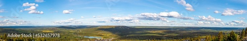 Landscape view from the top of Iso-Syöte hilltop with clouds and sky, Lapland, Finland