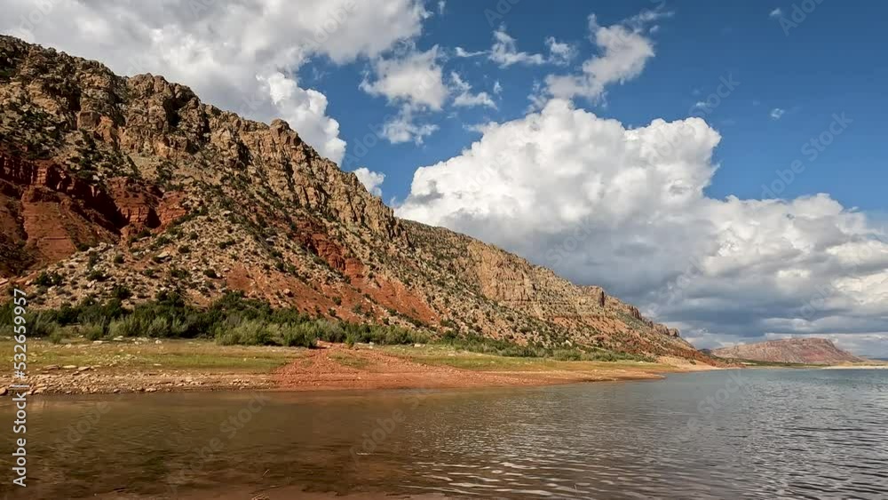 Panning view over Flaming Gorge where Sheep Creek flows in viewing the low water levels during the drought in Utah. Panning view over Flaming Gorge where Sheep Creek flows in viewing the low water levels during the drought in Utah.
