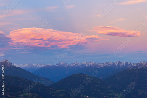 Fotografie Alpenglow at dusk in the Alps mountains